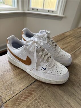 Nike White Sneakers with Tan Swoosh and Blue Stitching